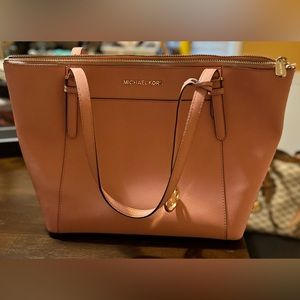 Pre-loved Michael Kors purse, small blue ink stains inside!!